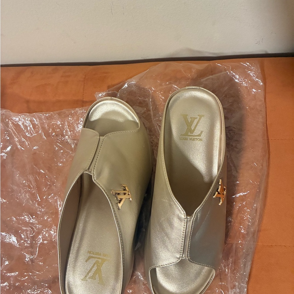 Louis Vuitton Metallic Gold Leather Slide Mules with LV Logo